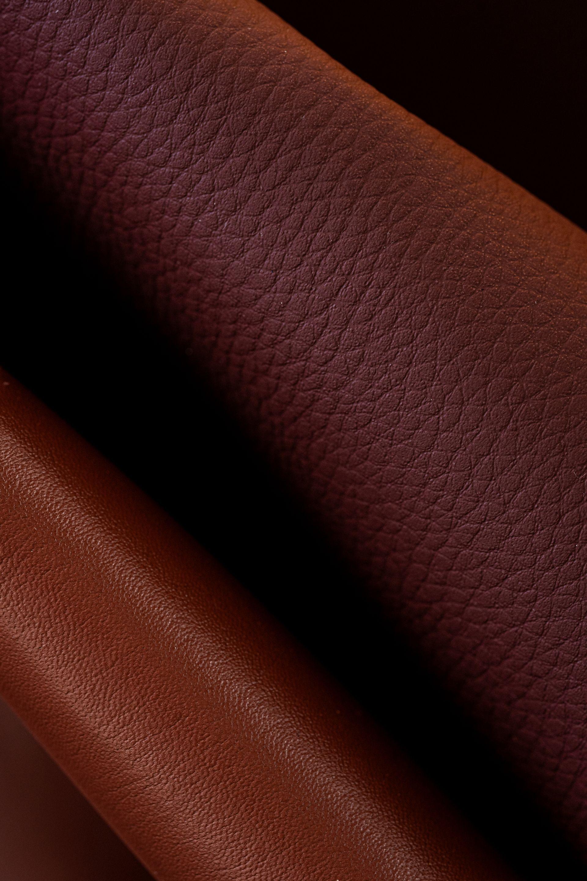Dark brown plant based leather closeup with texture