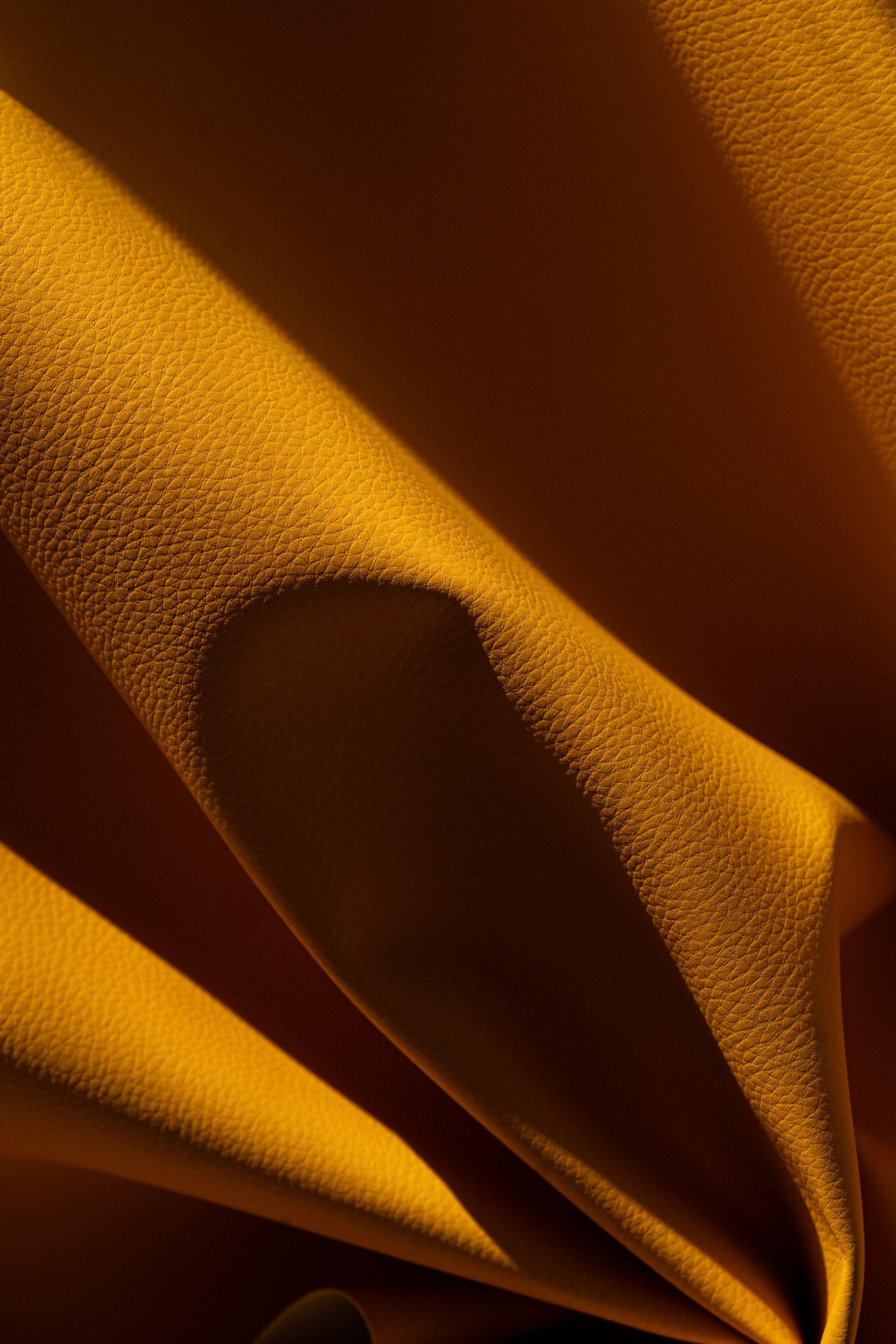 Yellow plant based leather closeup with texture
