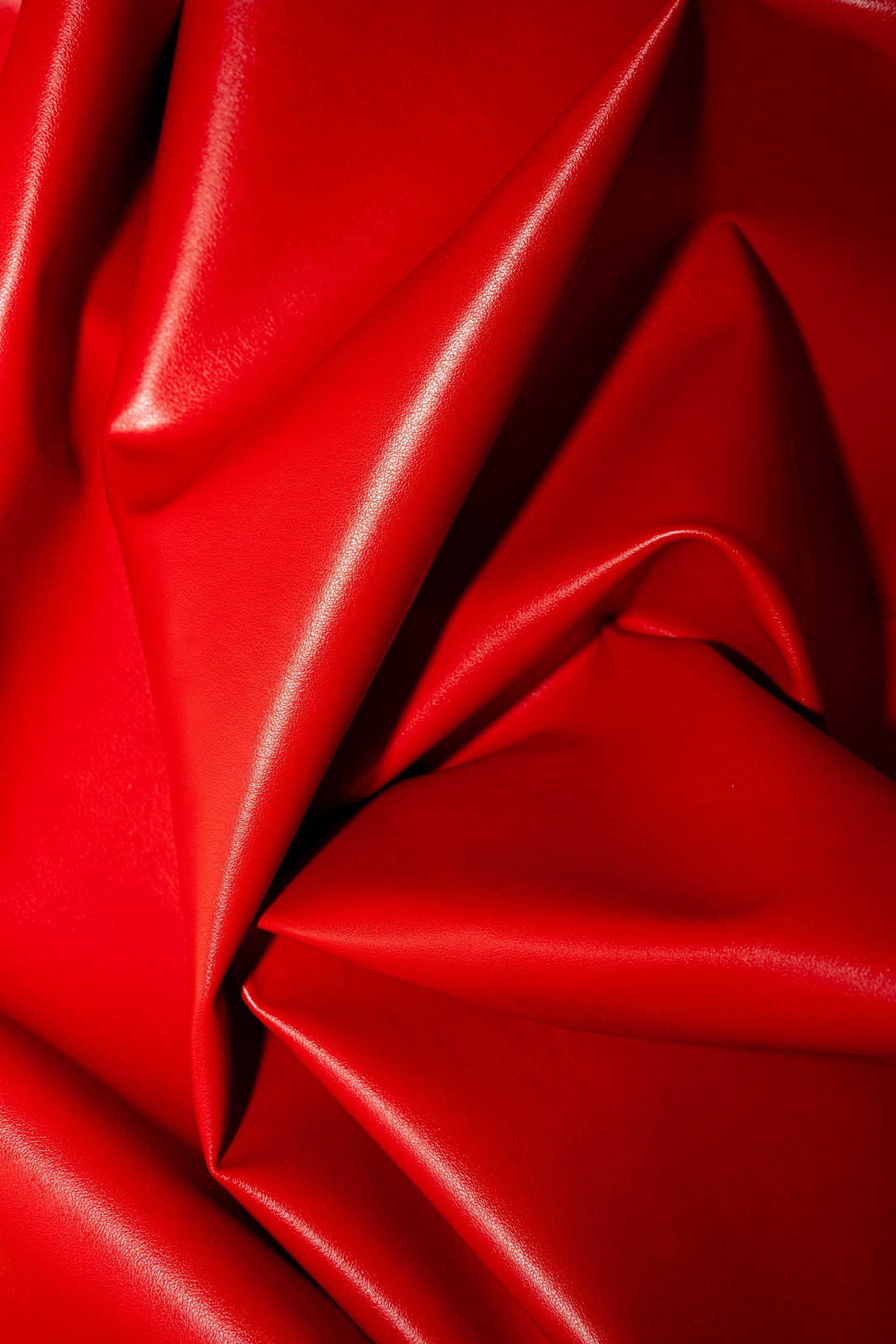 Red artificial plant based leather closeup